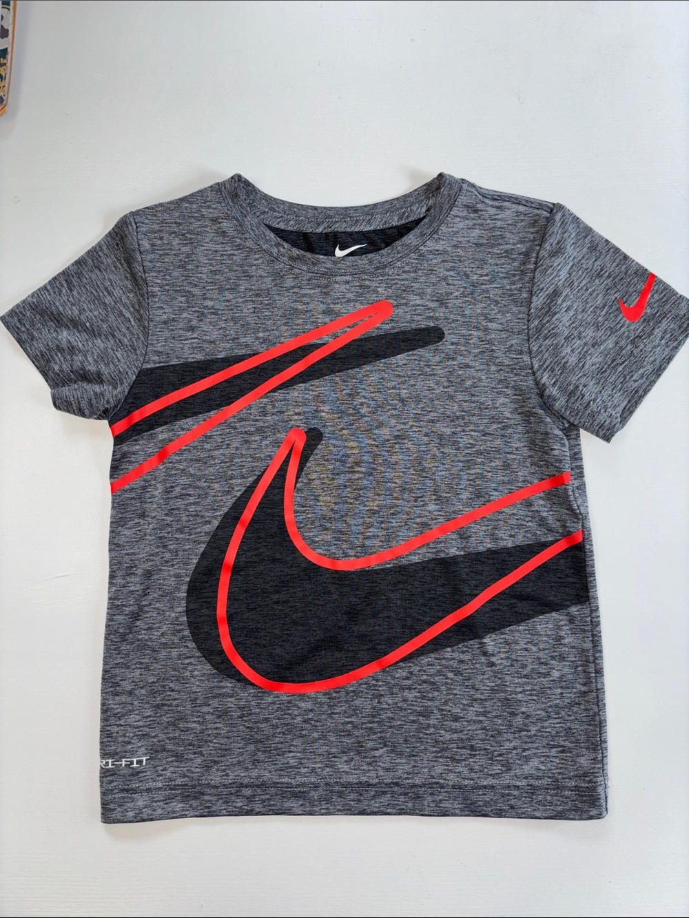 Nike Gray Tee with Black and Red Swoosh Graphic size 6/M age 5-6